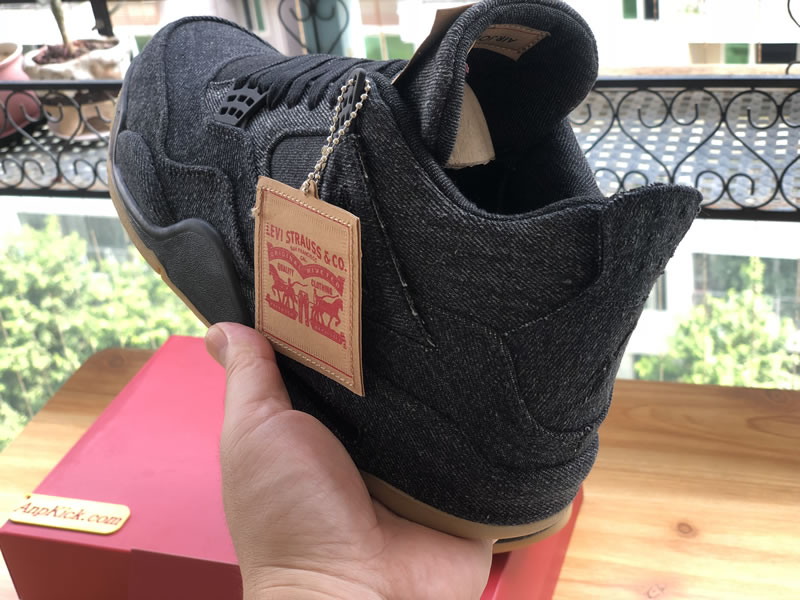 Levi's x Air Jordan 4 'Black Denim' In-Hand Behind Images Levi's x Air Jordan 4 'Black Denim' In-Hand Behind Images